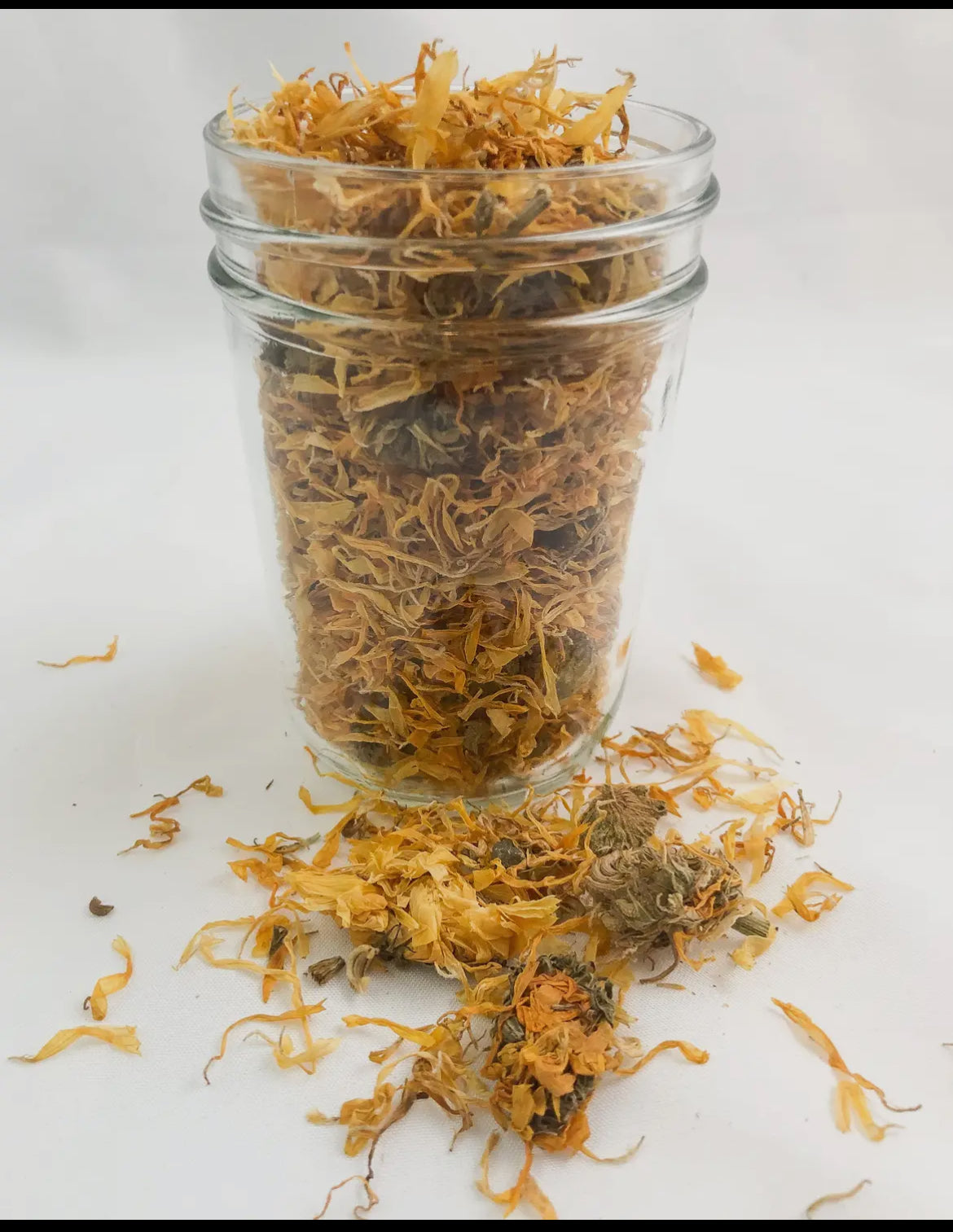 Dried Herbs Chamomile elderberry dandelion, Mint, peppermint, hibiscus in Small Jars for flavorful culinary creations.